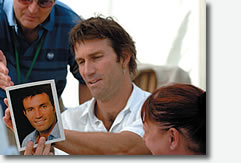 Pat Cash signing autographs in the Fairway Village hospitality suite. Wimbledon Gentlemen's Singles Champion in 1987